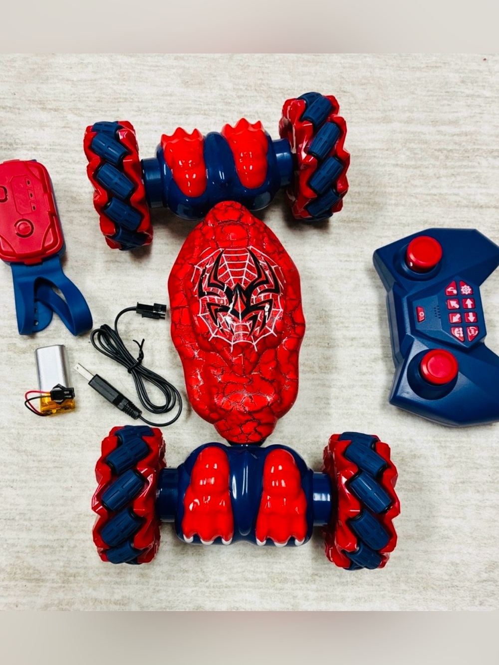 Dinosaur Gesture RC Car - red and blue with a spider and web on top